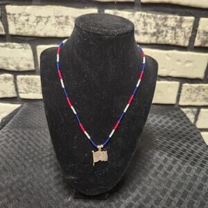 Hand-beaded red, white & blue necklace w/sterling silver flag pendant